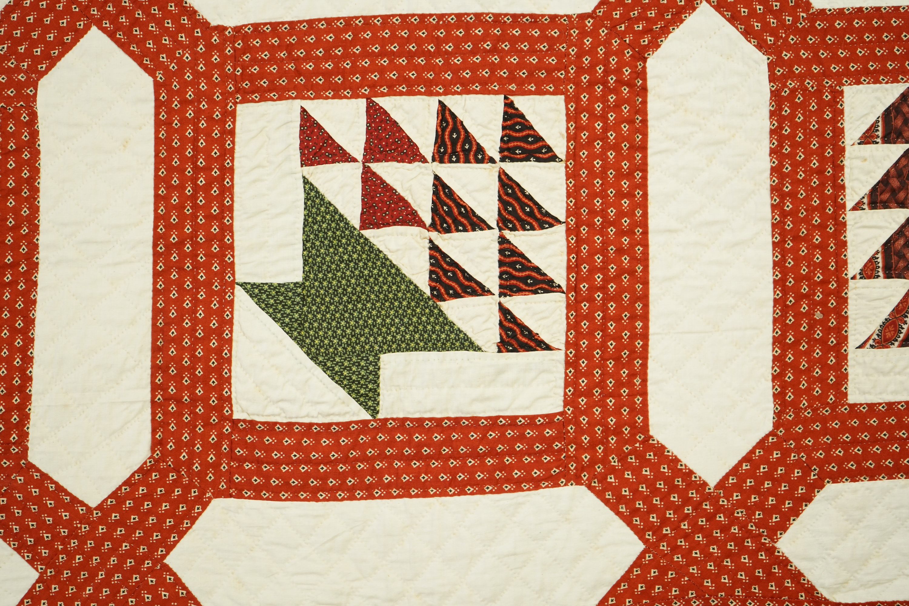 A handsome mid 19th century American ‘Basket’ hand pieced and hand quilted bed cover. An unlaundered Civil War quilt. The reverse side a printed quilted cotton. This quilt purchased in Virginia. 226cm x 168cm. Condition